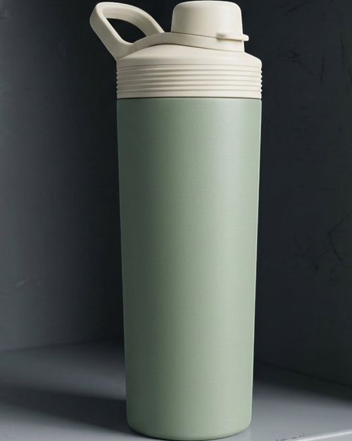Jndvg Protected-Straw Flip-Lid Double-Wall Travel Tumbler 20 oz Sage Cream - Lifestyle view